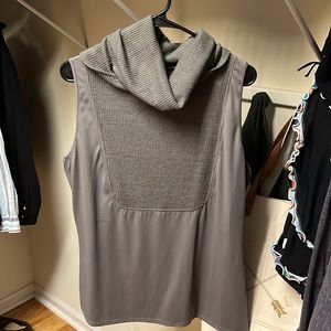 Super cute dressy tank size 1x fits more like XL